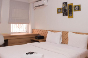 Homey and Cozy Stay Studio Apartment at Patraland Urbano By Travelio